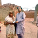 Man and woman with Navigator in their hand
